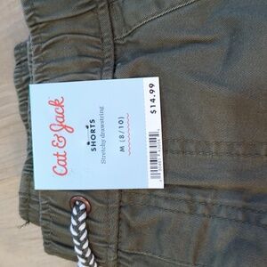 Nwt- cat & Jack army green shorts for boys. Here we go on the left pocket.